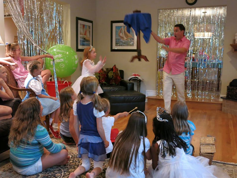 magician for kids birthday party does the Floating table